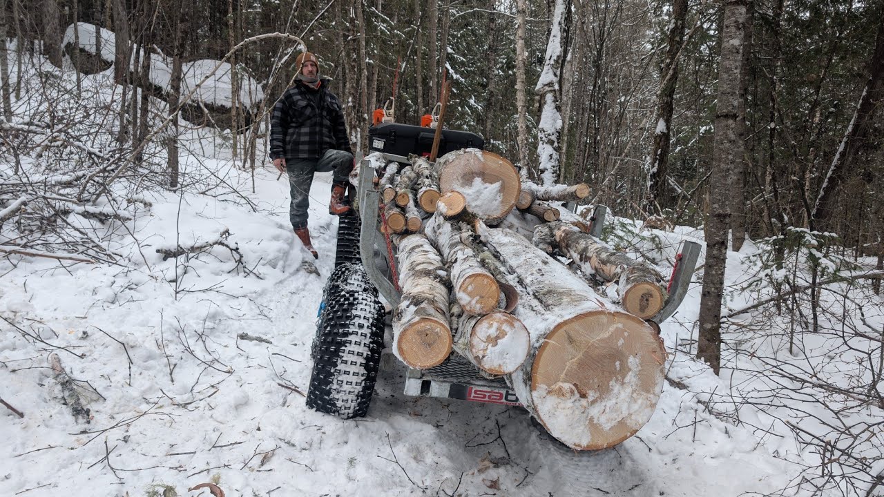 Part 1 Loading and transporting large birch logs with a four-wheel  in the mountain 