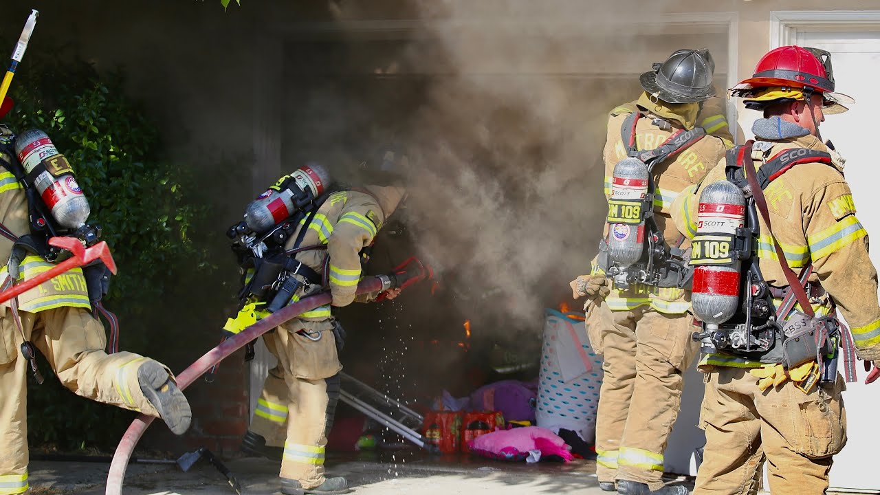 Sacramento Metro Fire District Firefighters Battle a Working Garage Fire in Carmichael CA