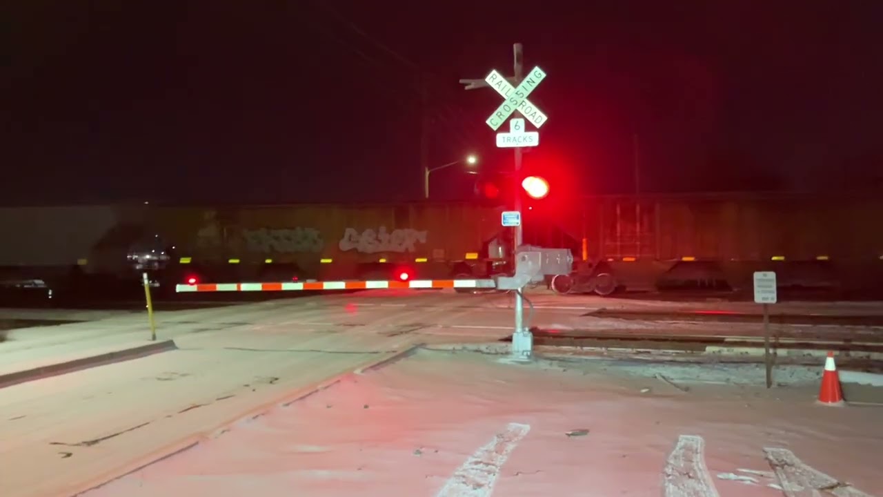 BNSF 521 Manifest Local East backs up West, S. 1st St. Railroad Crossing, Lincoln NE