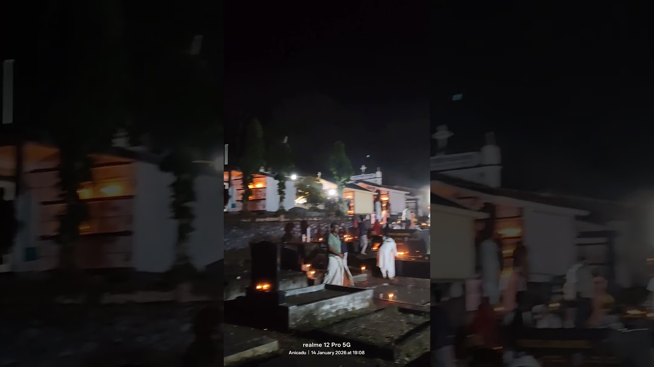 palliperunnal day lighting candles in cemetery