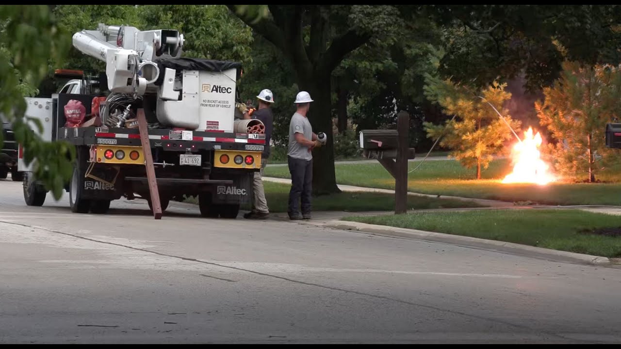 Downed powerline arcing on Beverly Avenue in Arlington Heights — after storm