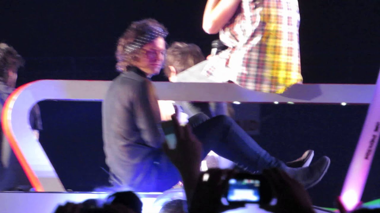 Harry interacting with a fan during Moments - Toronto