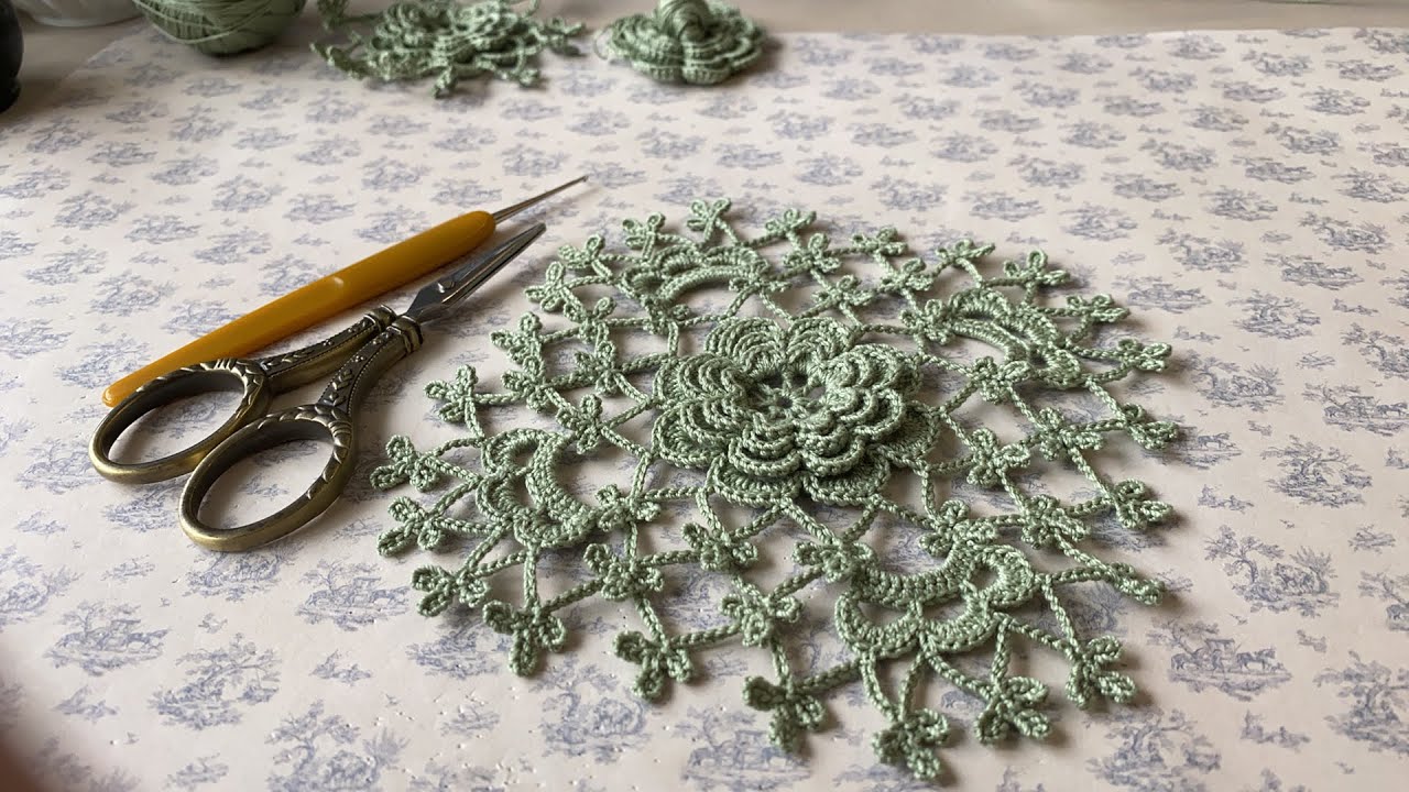 Rosette surrounded by square-shaped ground. 12-th ground. Masterpieces of Irish crochet lace, p35.