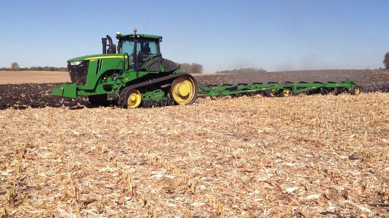 Plowing with 9560RT and Deere 3710 10 bottom plow pt 1