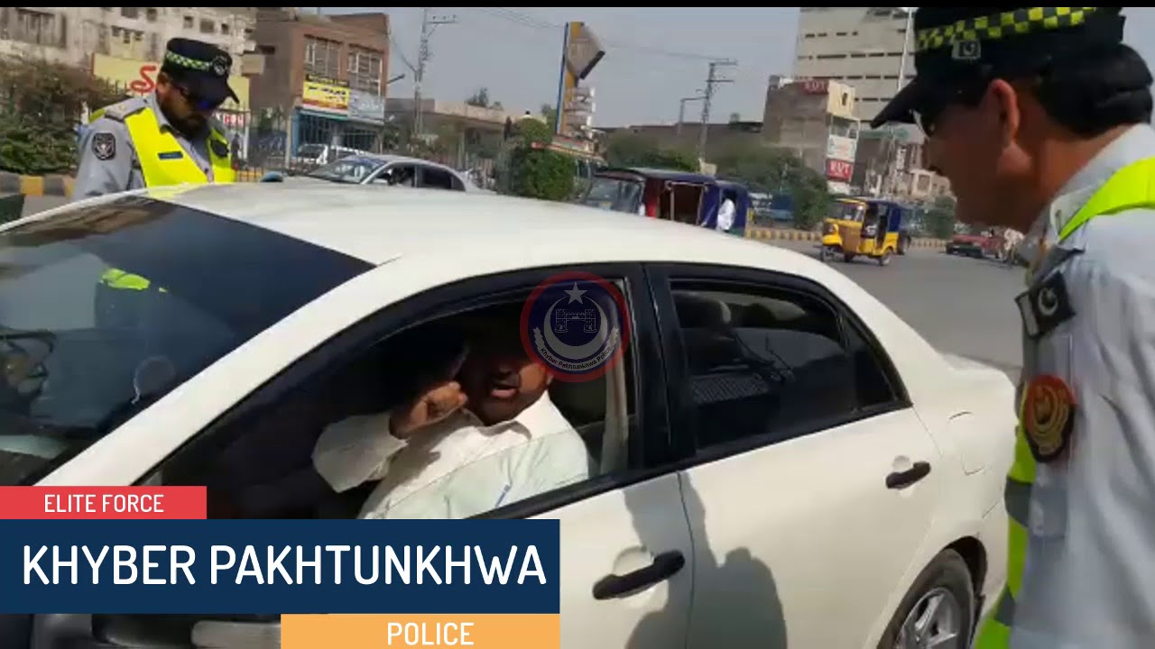 Peshawar Traffic Warden Police Issue Challan to  MPA PK 6 Haji Fazal Elahi.Real Change In KPK