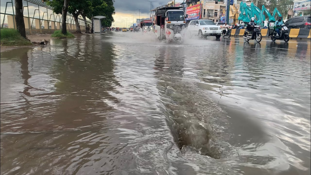 Prevent Rain Storm Flooding and Remove Garbage Clogged Culvert Drain on the Street