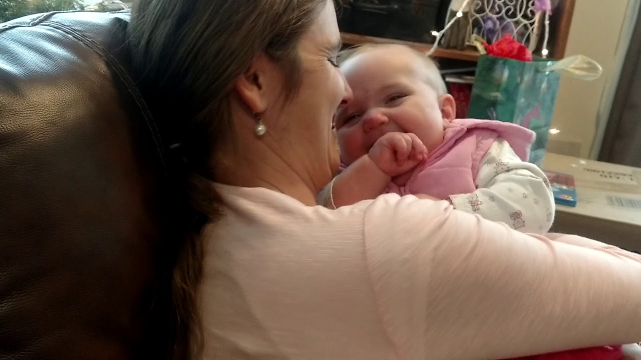 Tickling baby on Christmas.