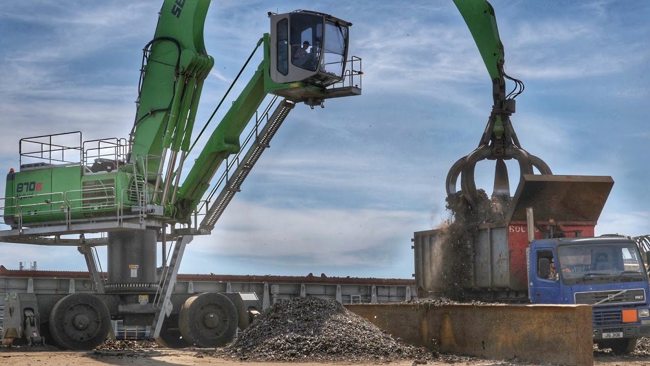 Sennebogen 870E Material Handler Working in Metal Recycling.