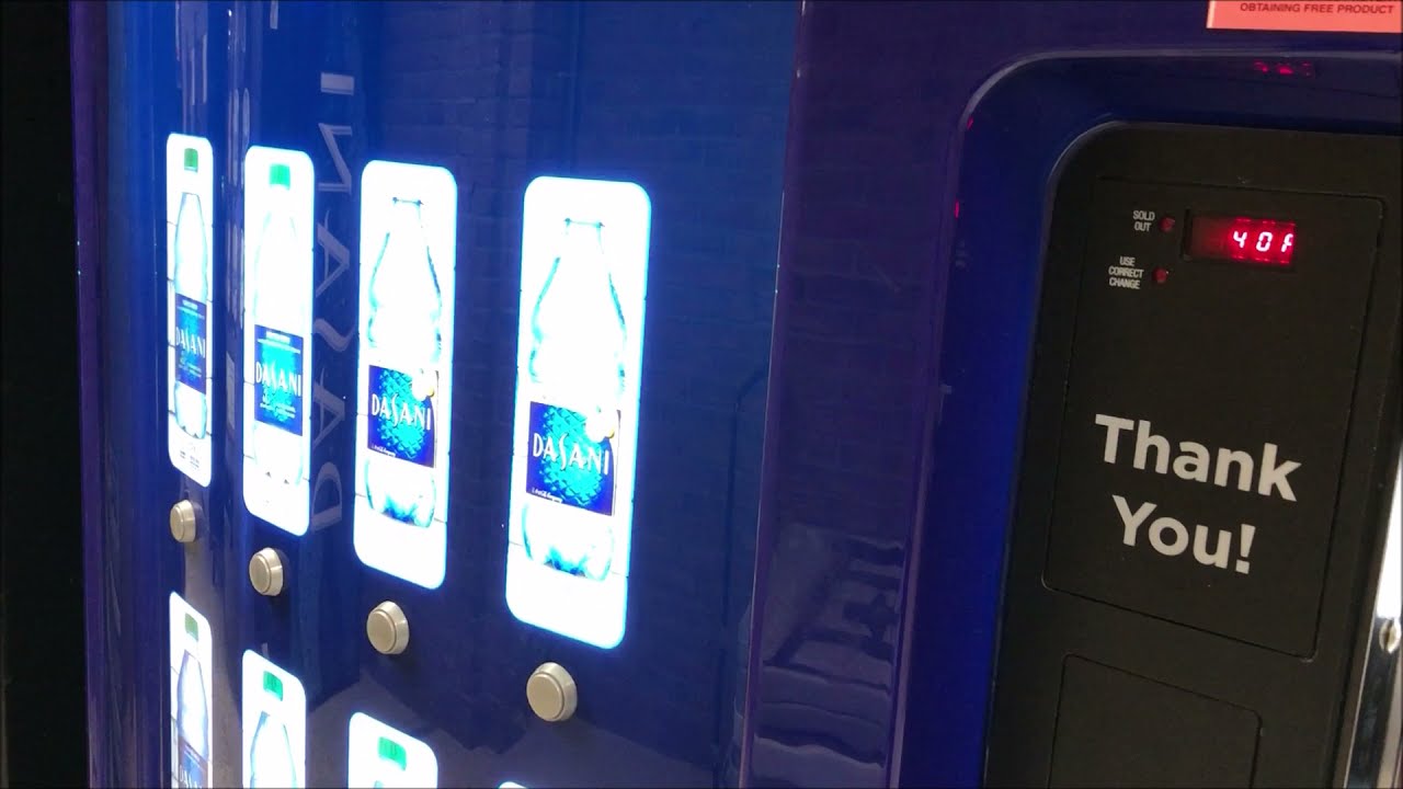 Buying water from a Dasani Vending Machine ($1.75)