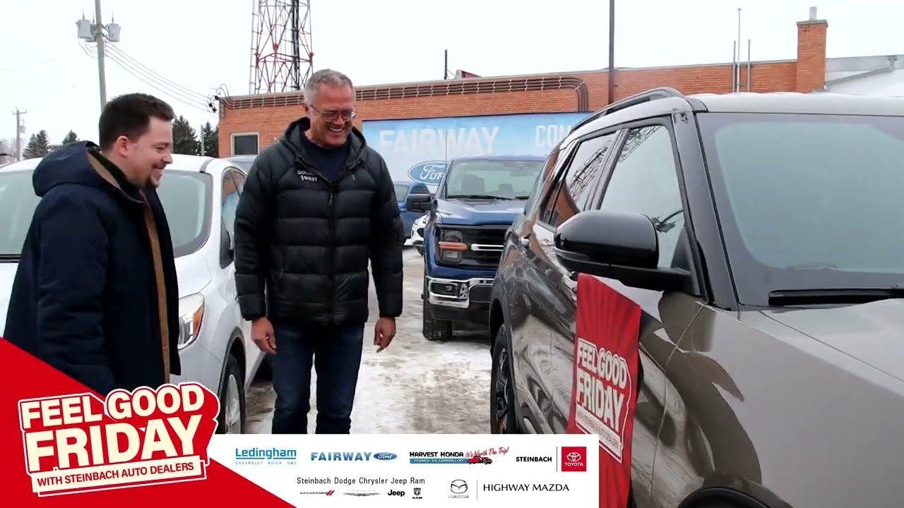 Blessing people at the pump with the Steinbach Auto Dealers