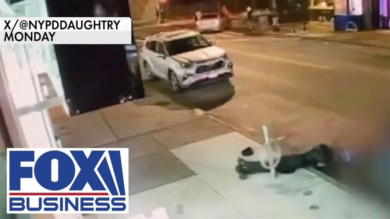 Elderly woman dragged down street by a migrant on moped