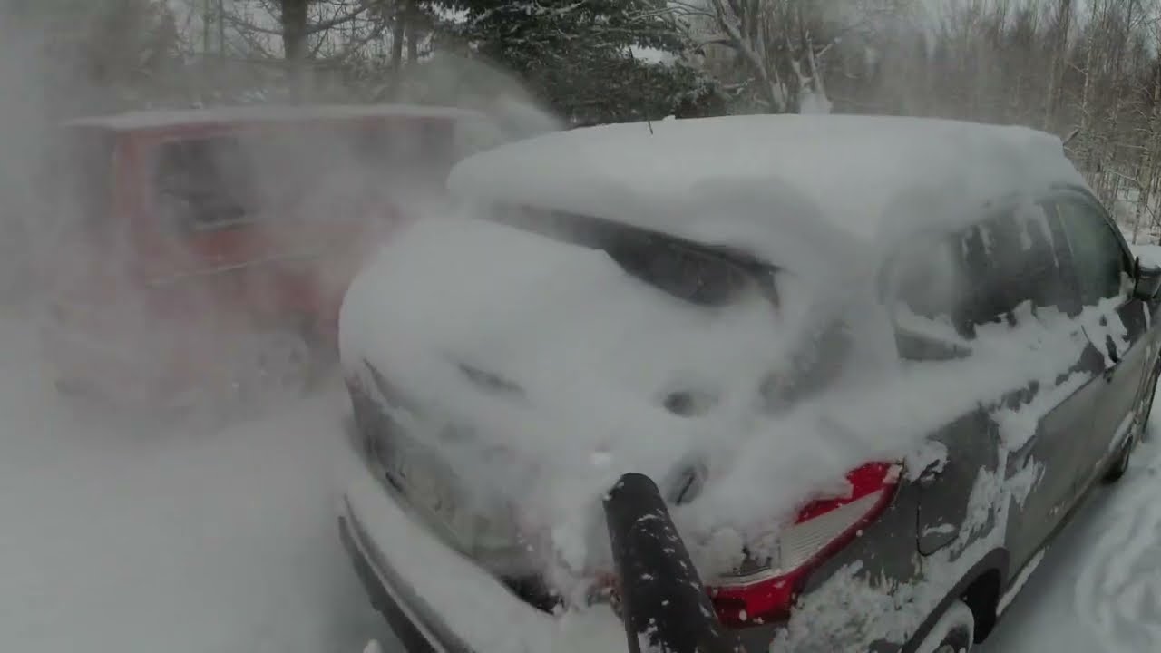 Milwaukee M18 leaf blower with 12Ah battery on vehicle snow removal. Joensuu, Finland 10.12.2022