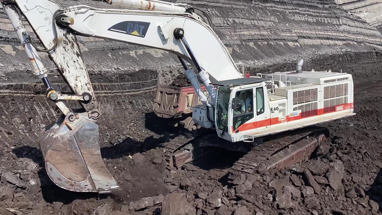 White Cat 385C Excavator Loading Coal On 4 Axle Mercedes & MAN Trucks - Interkat SA