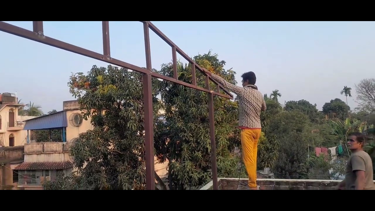 দোতলার ছাদে টিনের শেড তৈরির আধুনিক পদ্ধতি
