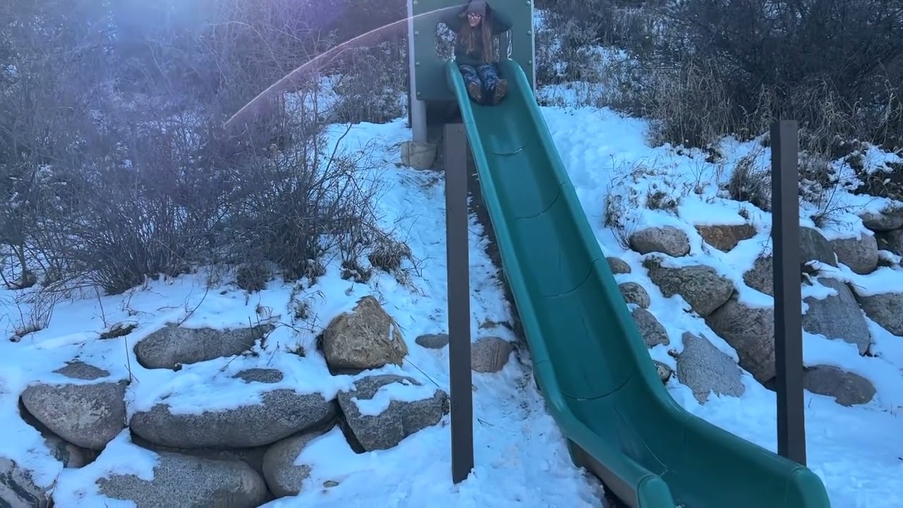 Noah on slide in Colorado