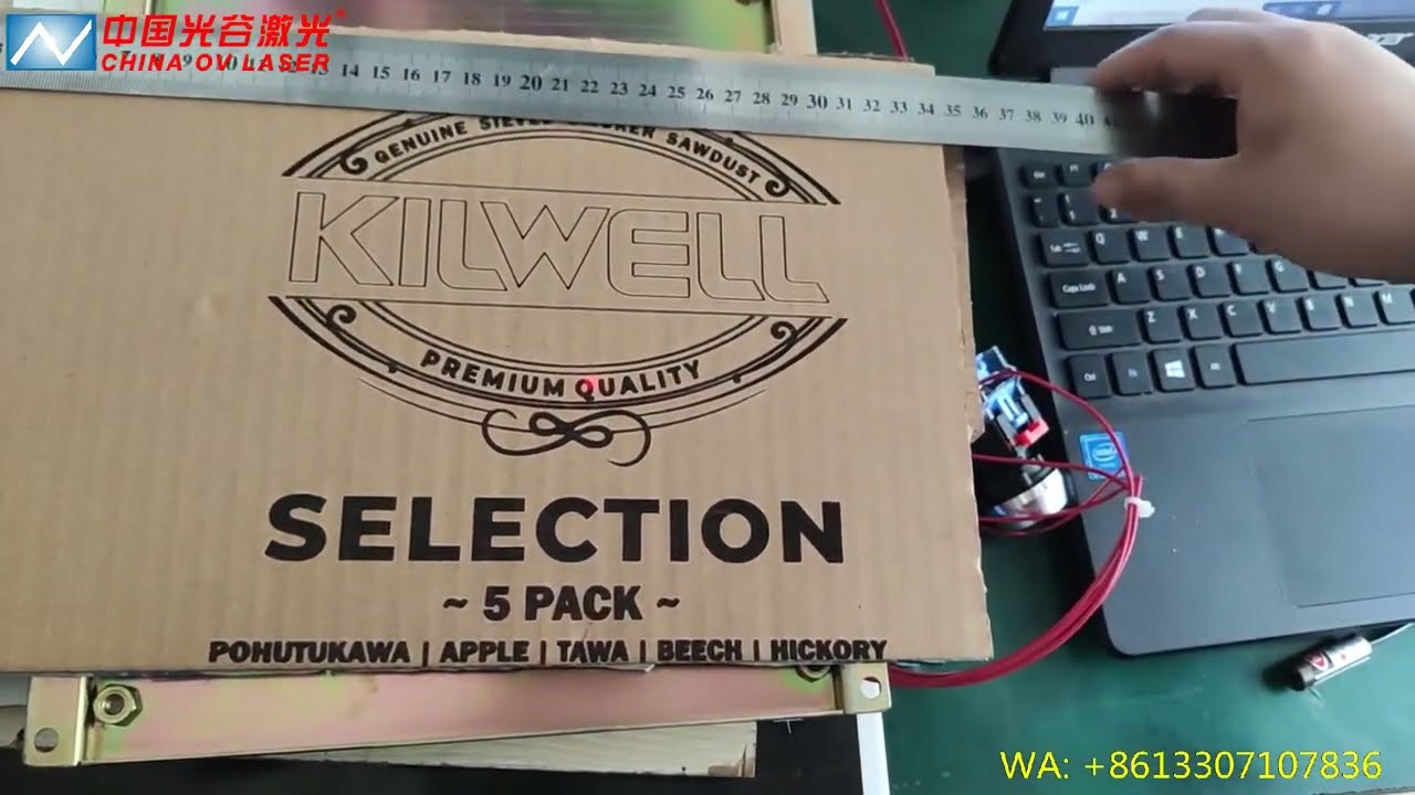 cardboard paper package box marking by RF galvo co2 laser engraving marking machine-OV LASER