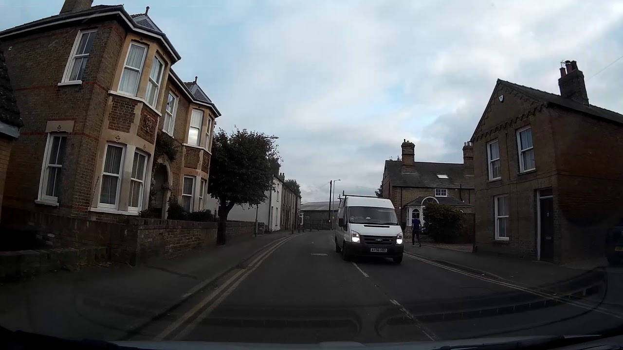 Cambs Dashcam - Cottenham, Cambridgeshire: Transit van comes on the wrong side of the road!