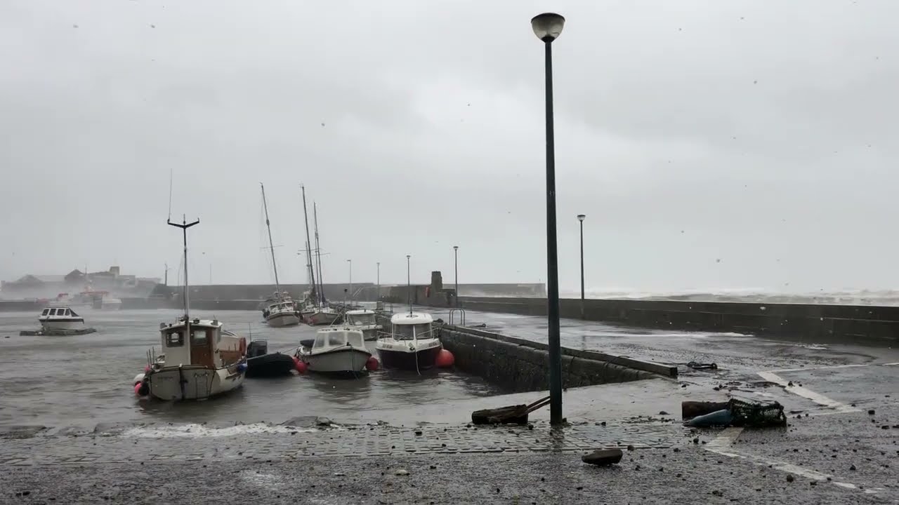 Storm Babet Scotland - Stonehaven Harbour Day 1,  strong wind, wild waves, boats, heavy rain,