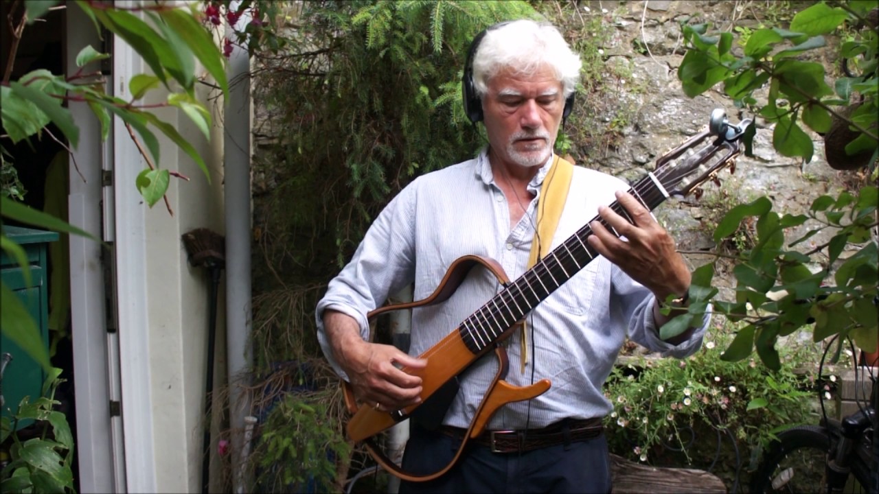 'And I Love Her' by the Beatles. Classical guitar. New Recording Harry Verey with  Yamaha SLG 130