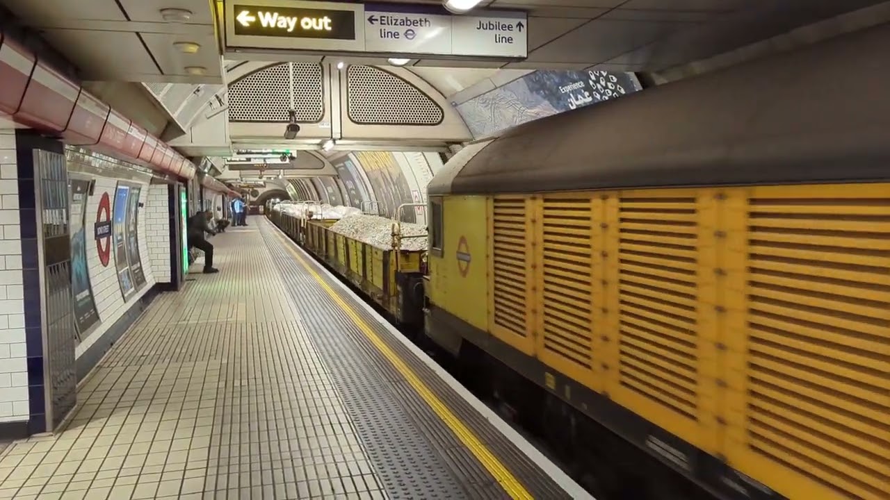 LU Battery Locomotive passing Bond Street