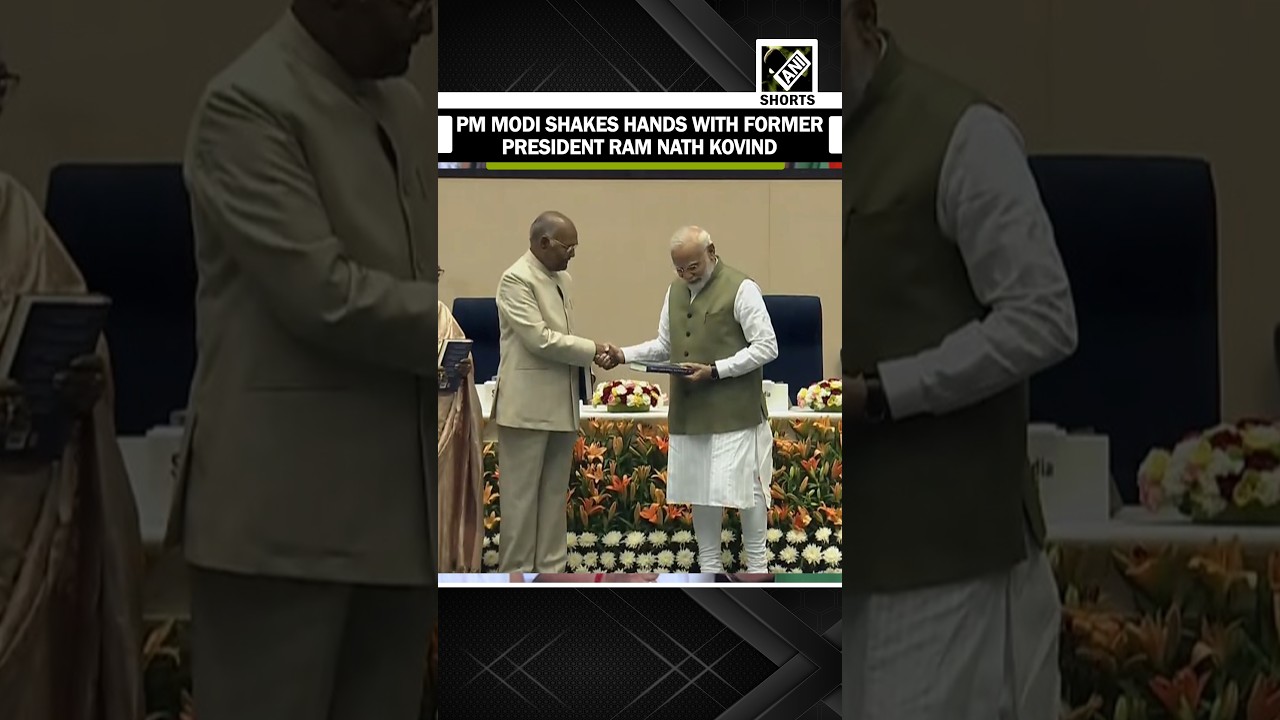 PM Modi Shakes hands with Former President Ram Nath Kovind during autobiography release event