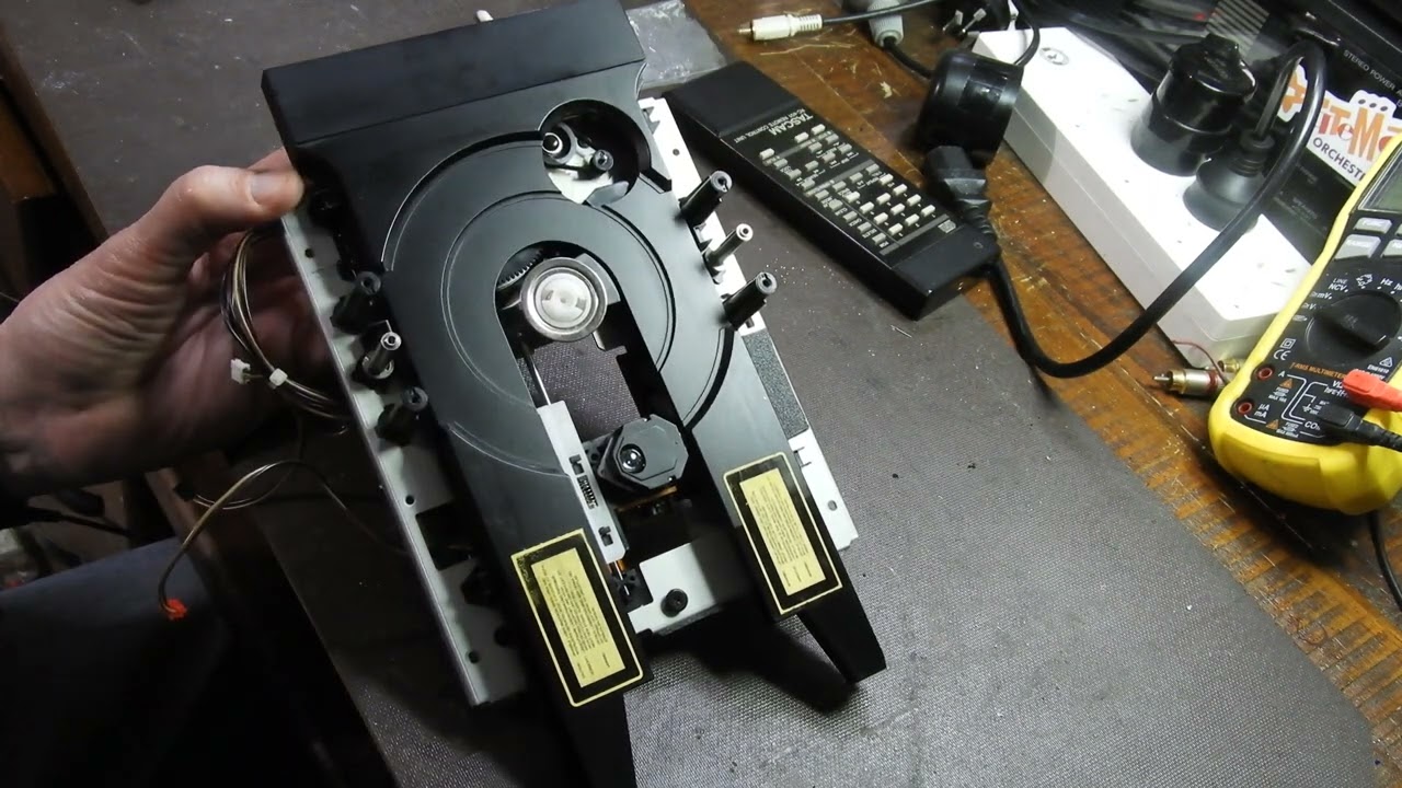 Laser mechanism re-assembly following a service - Teac VRDS T-1 Transport is used as an example.