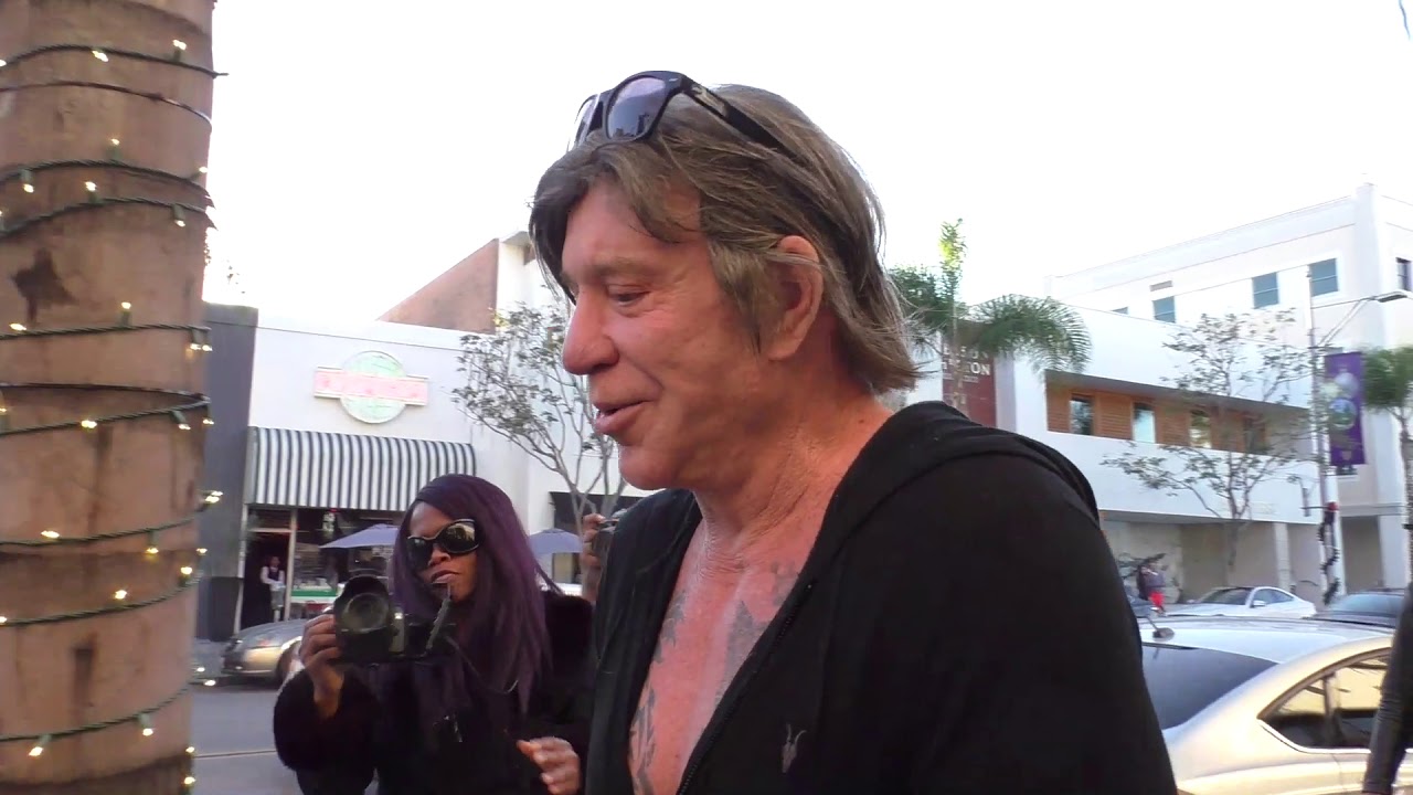 Mickey Rourke talks about how he does not know who Harvey Levin is while shopping in Beverly Hills