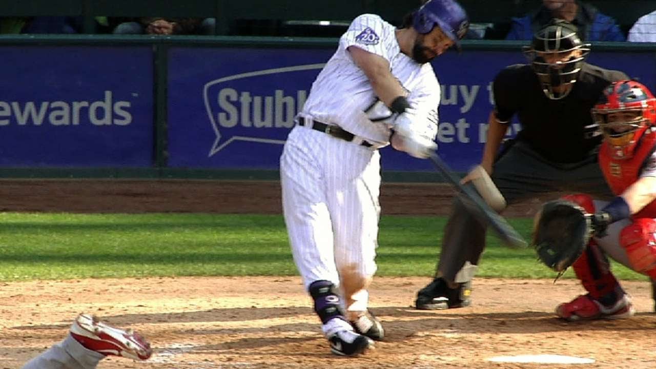 Helton uses hidden ball trick, hits homer