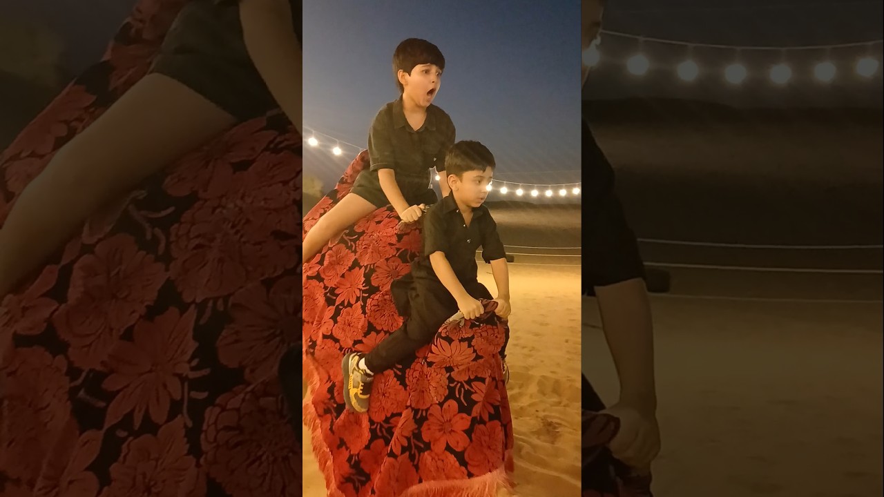 two kids enjoy the camel ride 🐫 🐪 #arabicmusic #saharadesert #camel #love