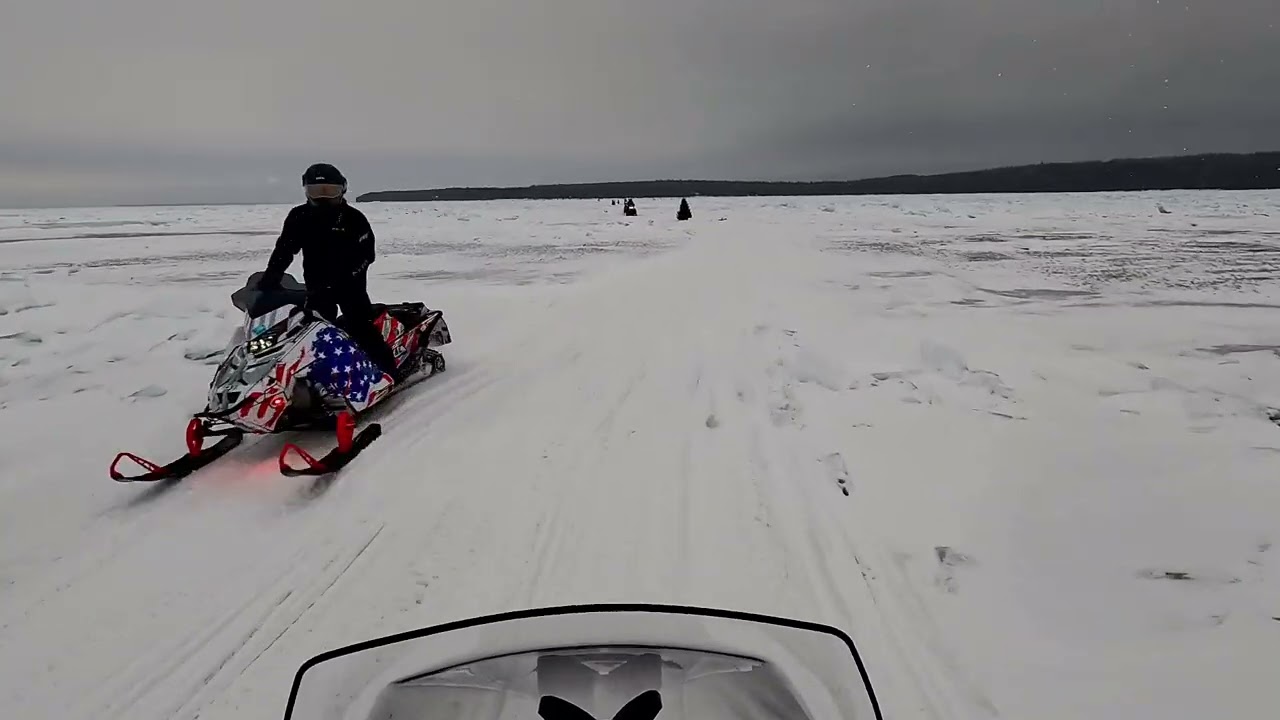 On our electric sled heading back to Mackinac Island with three thermal bags of fruit & vegetables 
