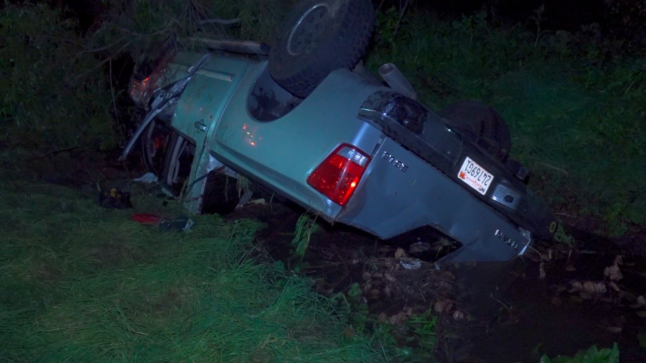 Driver Flees After Truck Overturns Into Canal Near SR-905