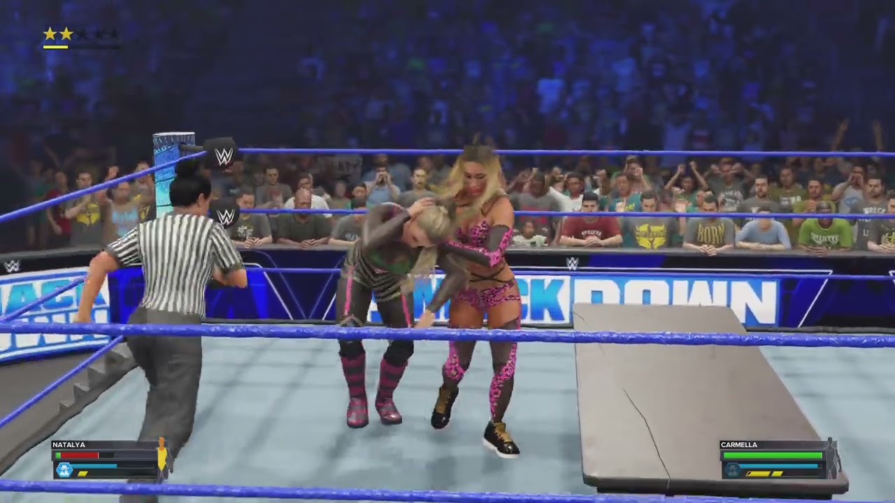Carmella vs natalya submission match wwe2k23