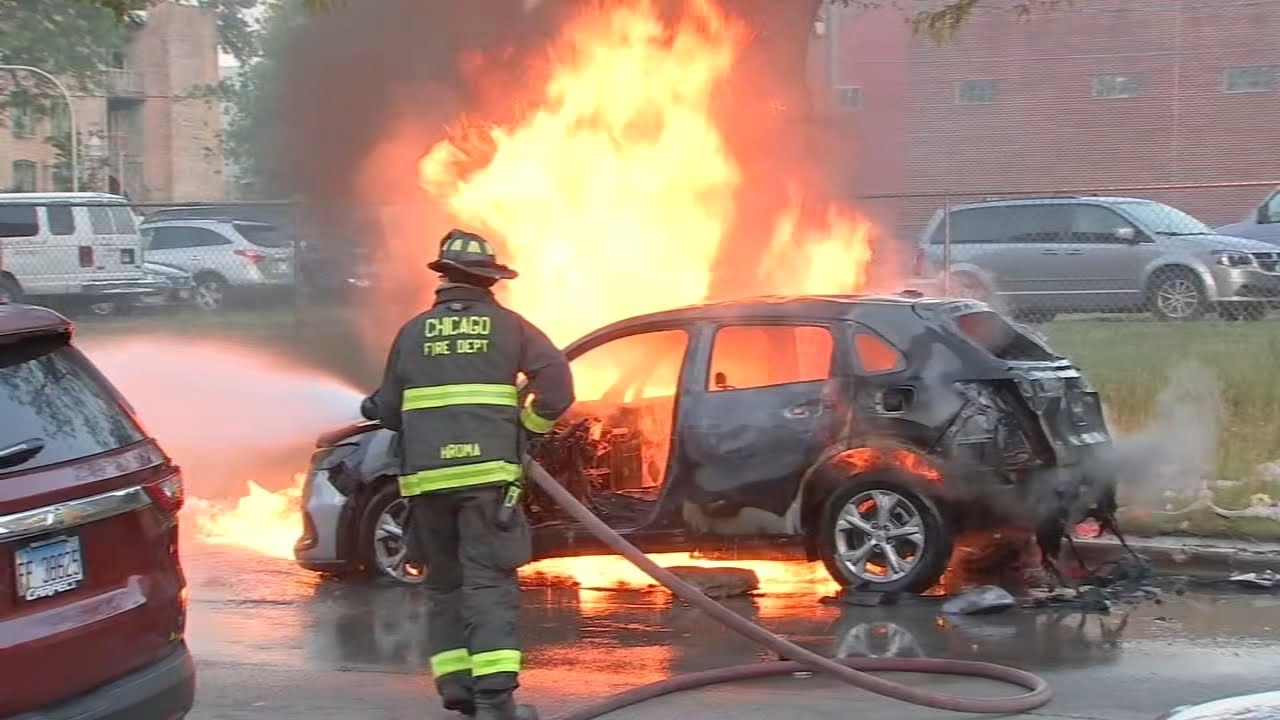 Firefighters battle car fire on South Side, video shows