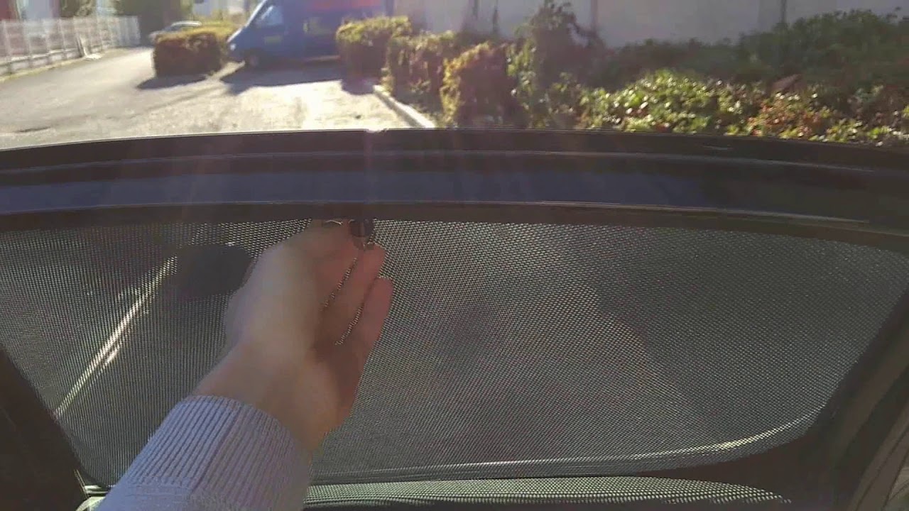 PEUGEOT 407 - les pares soleil arrieres en option