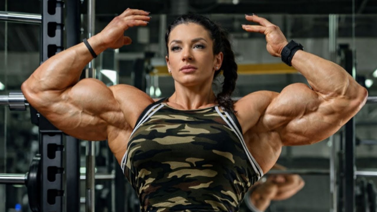 THIS  31 YEAR OLD GERMAN FEMALE BODYBUILDER HAVE SOME MASSIVE BICEPS : SCHROEDER