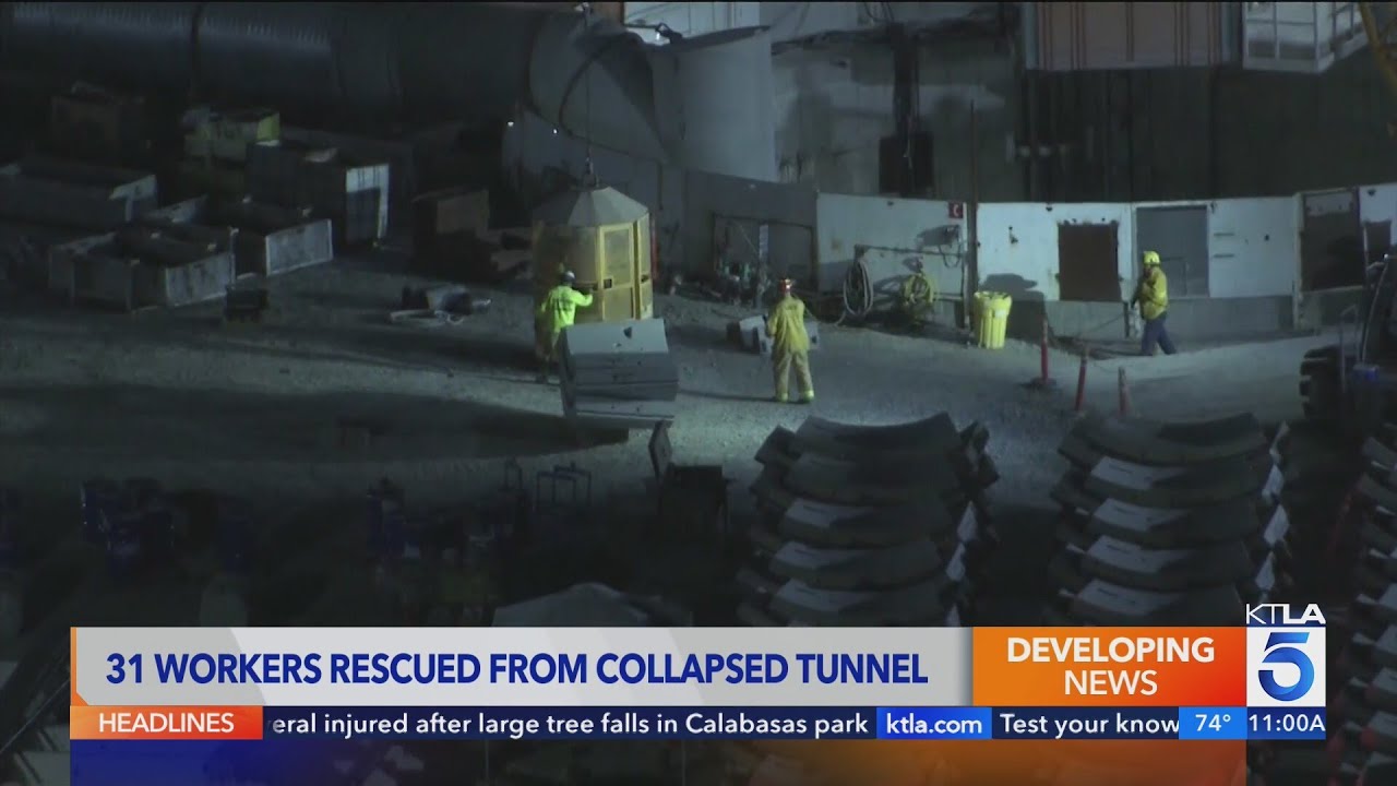 Workers rescued after tunnel collapse