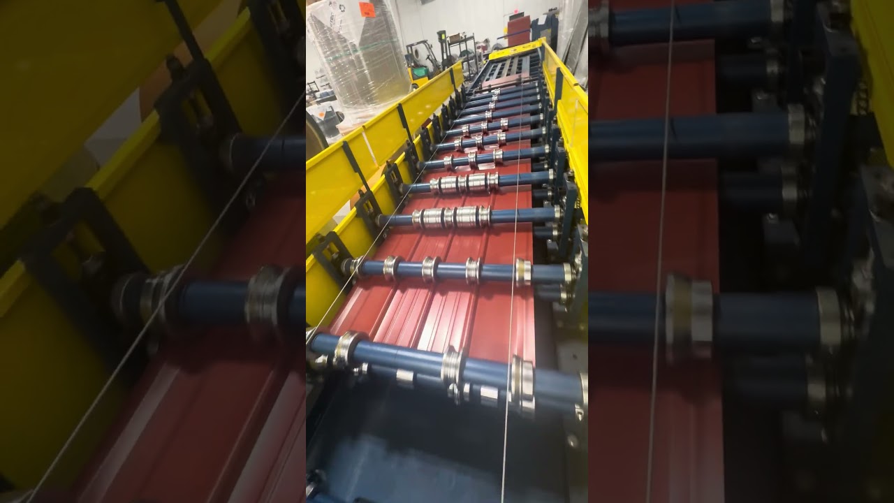 Rollforming some LONG Barn Red Tuff-Rib metal roofing panels this morning! #machine #rollforming