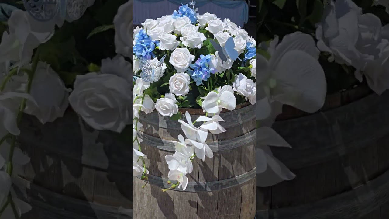 Mis quince años tonos baby Blue,plata , blanco , mariposas  y flores como detalles 