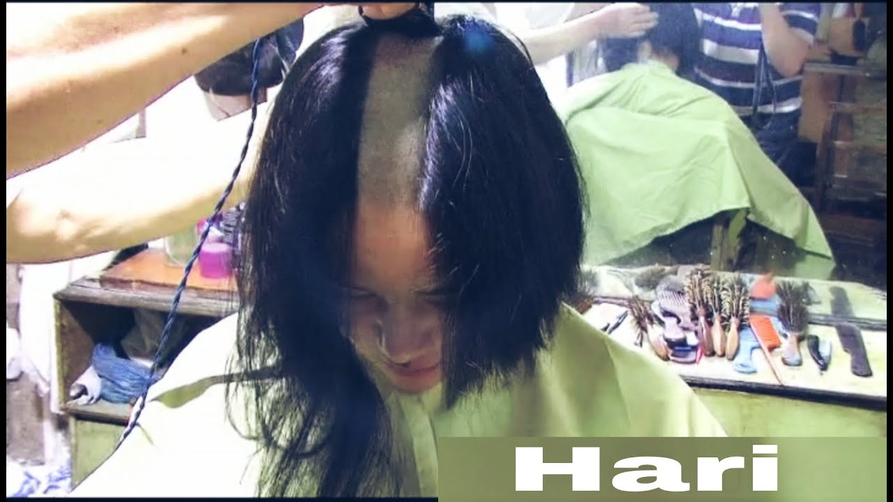 Girl head shave at salon