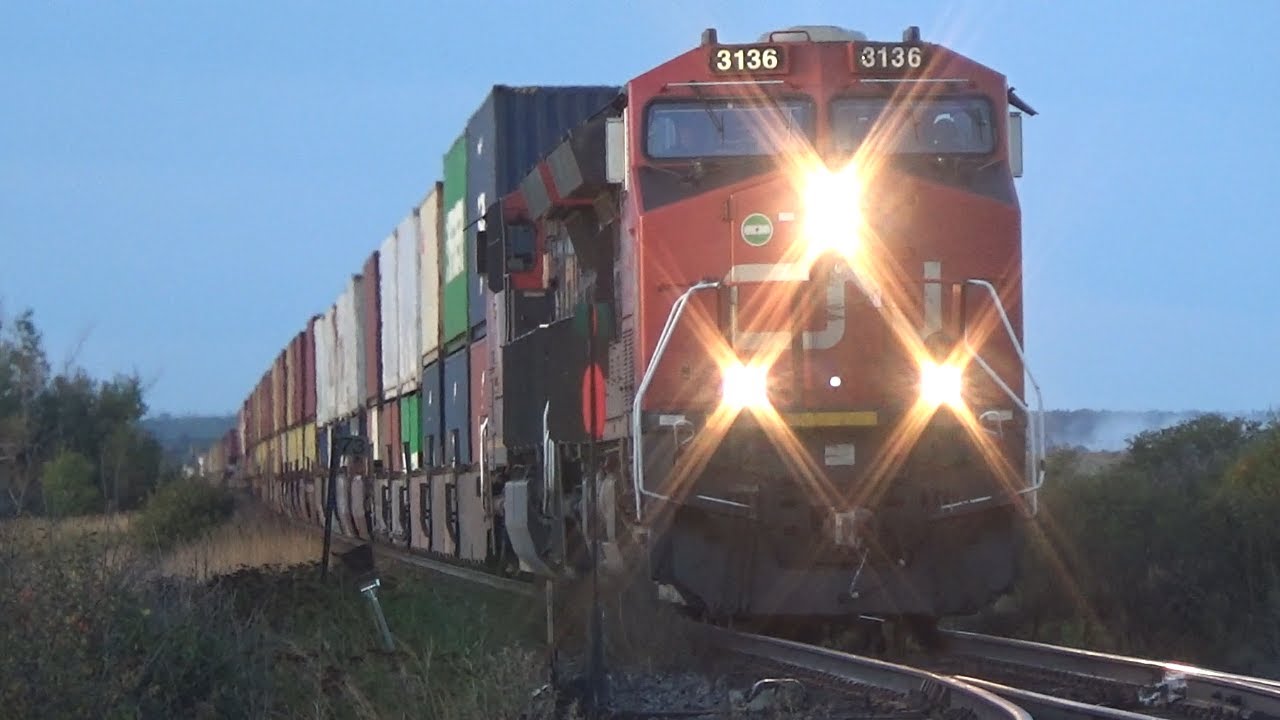 Long Extra Stack Train CN X121 passing thru Nappan, NS at Track Speed