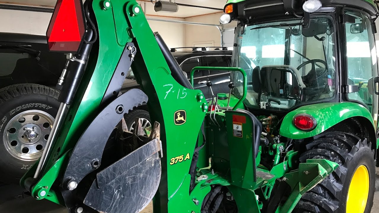 John Deere 375A Backhoe mounting