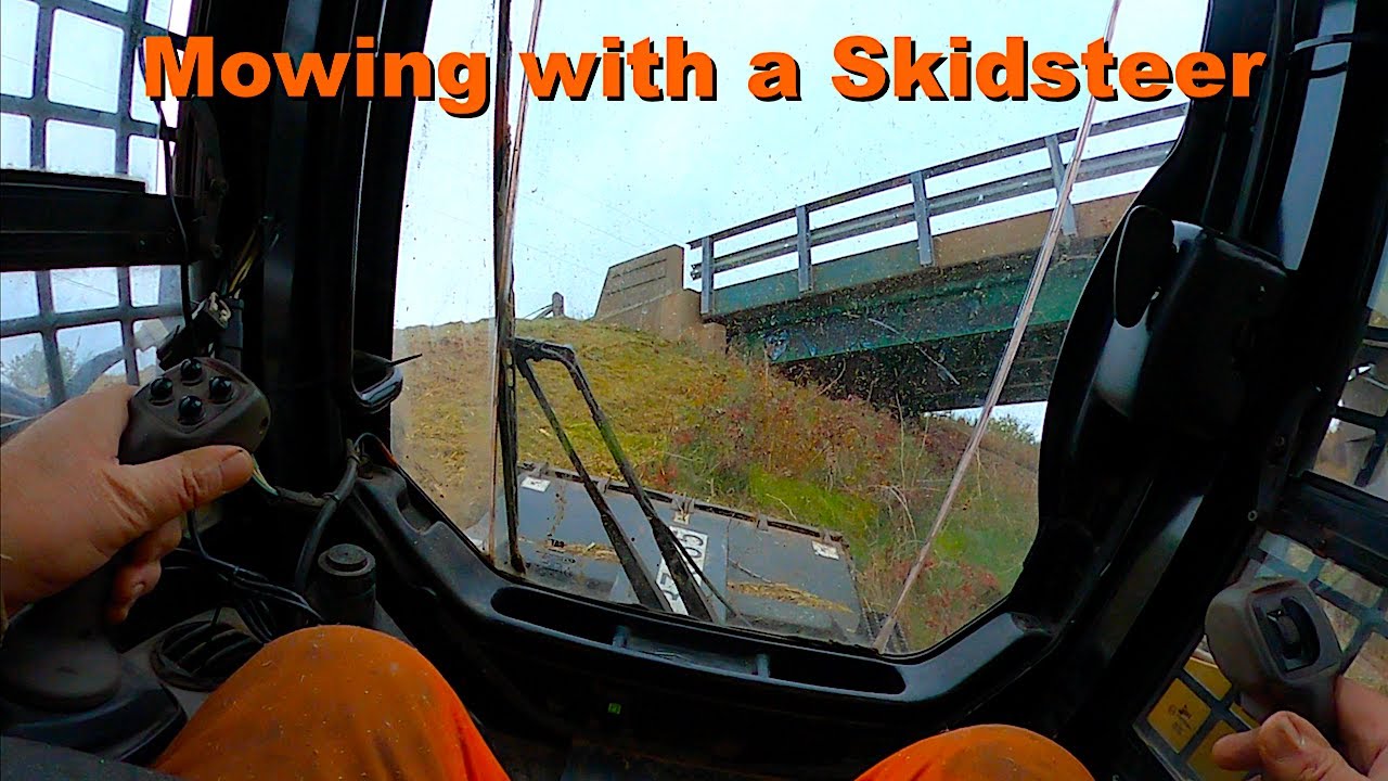 Mowing a Steep Incline~Caterpillar 257B