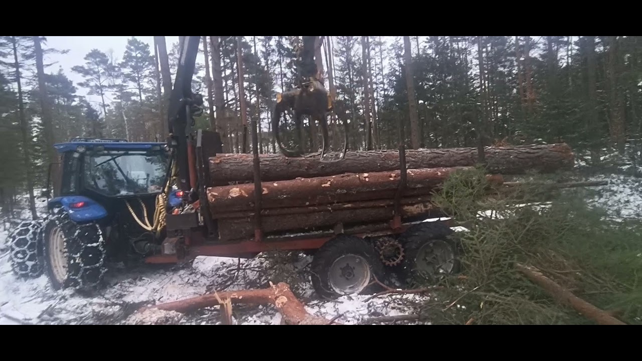 NH TL90 kör timmer