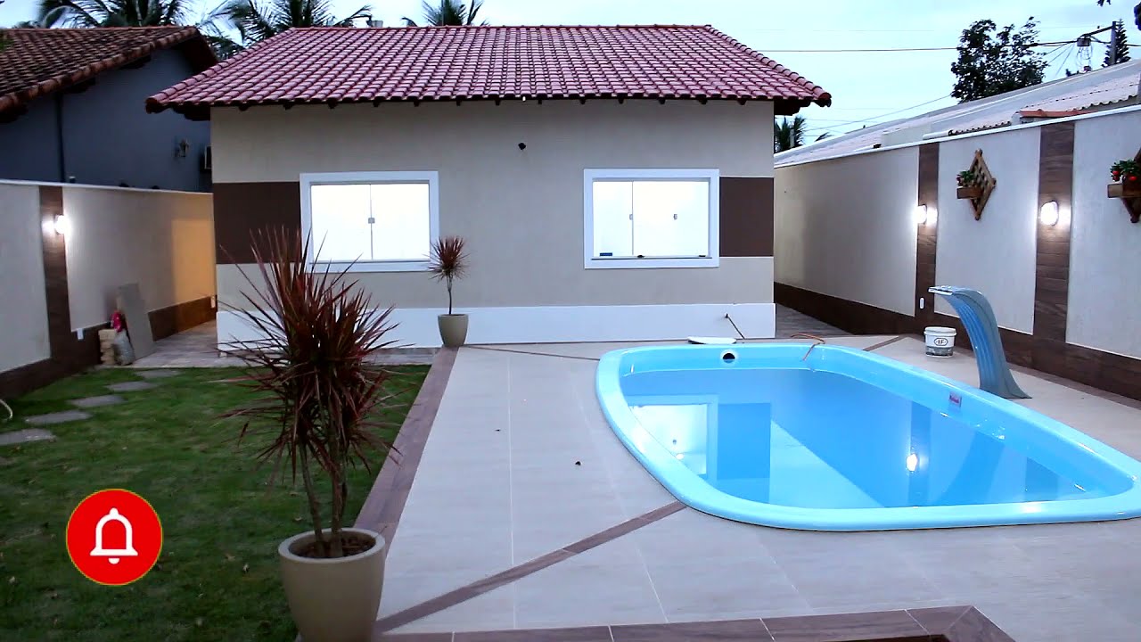 OLHA A ILUMINAÇÃO DESSA CASA EM MARICÁ COM PISCINA A VENDA POR 750 MIL