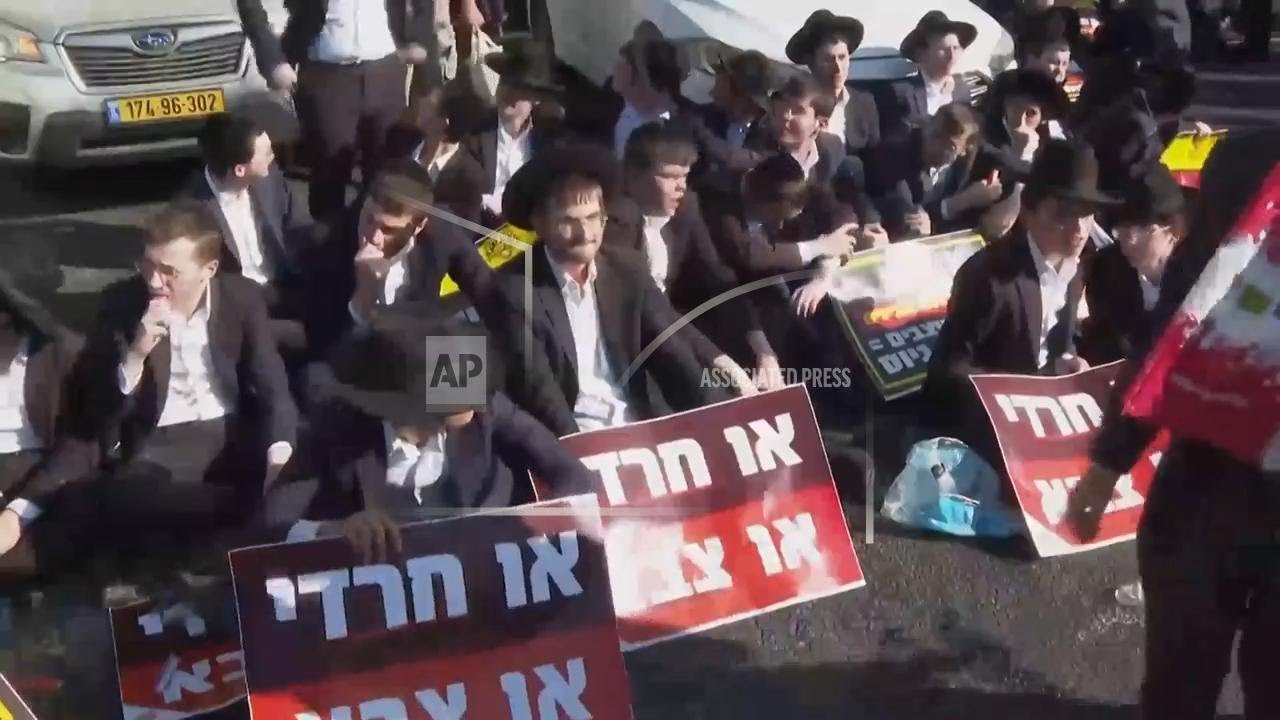 Ultra-Orthodox Jews block highway in Jerusalem to protest enlisting for military service