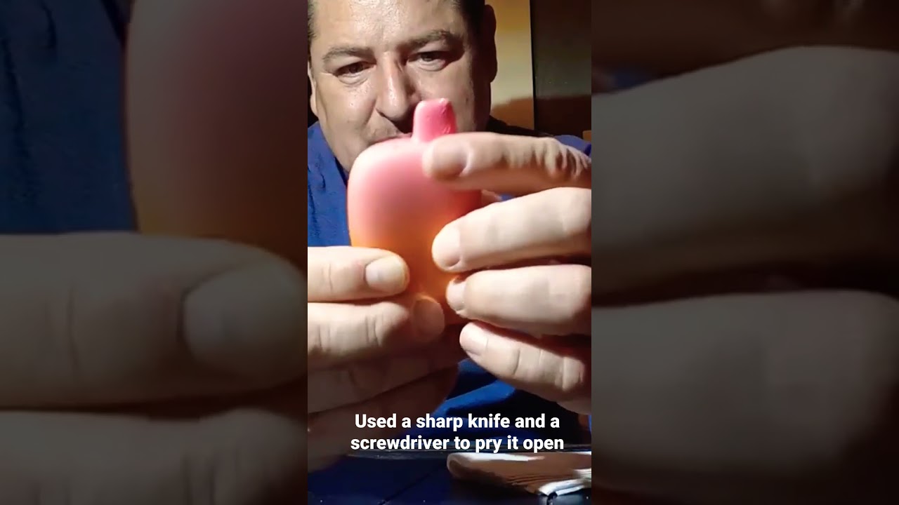 Refill Flum Pebble disposable vape with a knife and a screwdriver