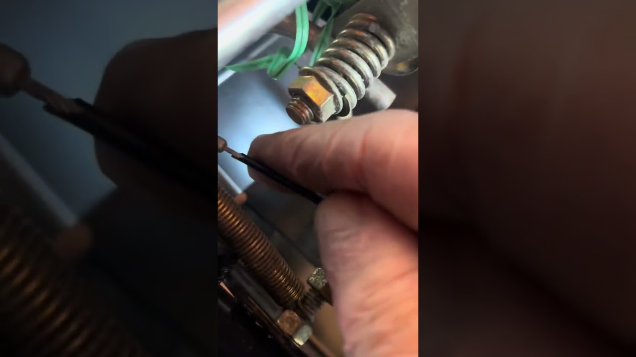 Replacing a lower traction cable of an Ariens Deluxe Snowblower
