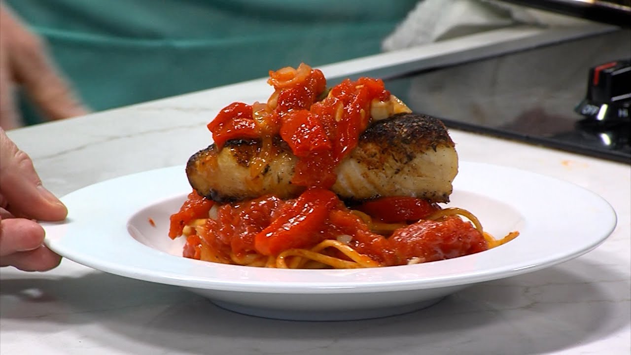 Chef Joe Bellia is Making a Blackened Halibut Dish in the Kitchen Concepts Kitchen