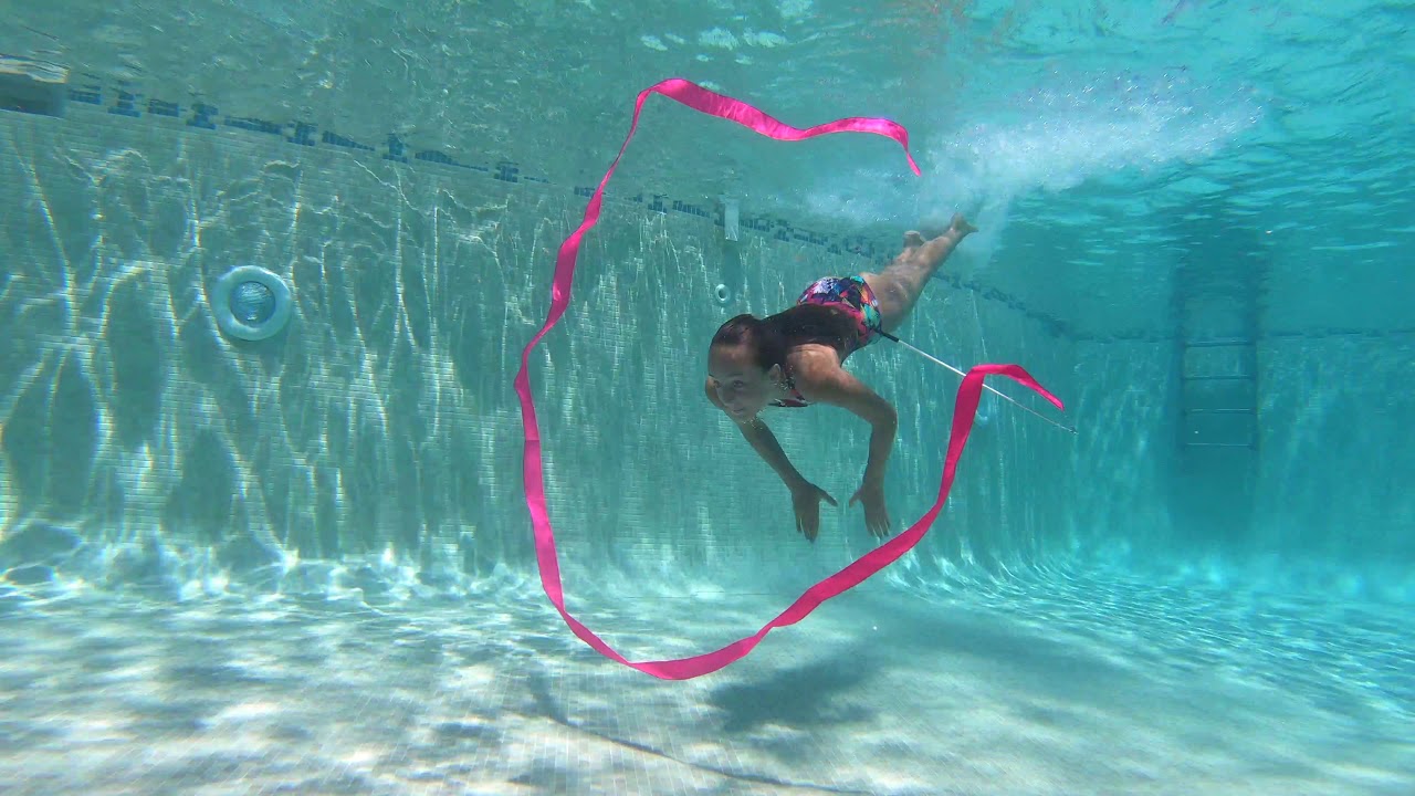 Carla swimming Underwater doing Gymnastics
