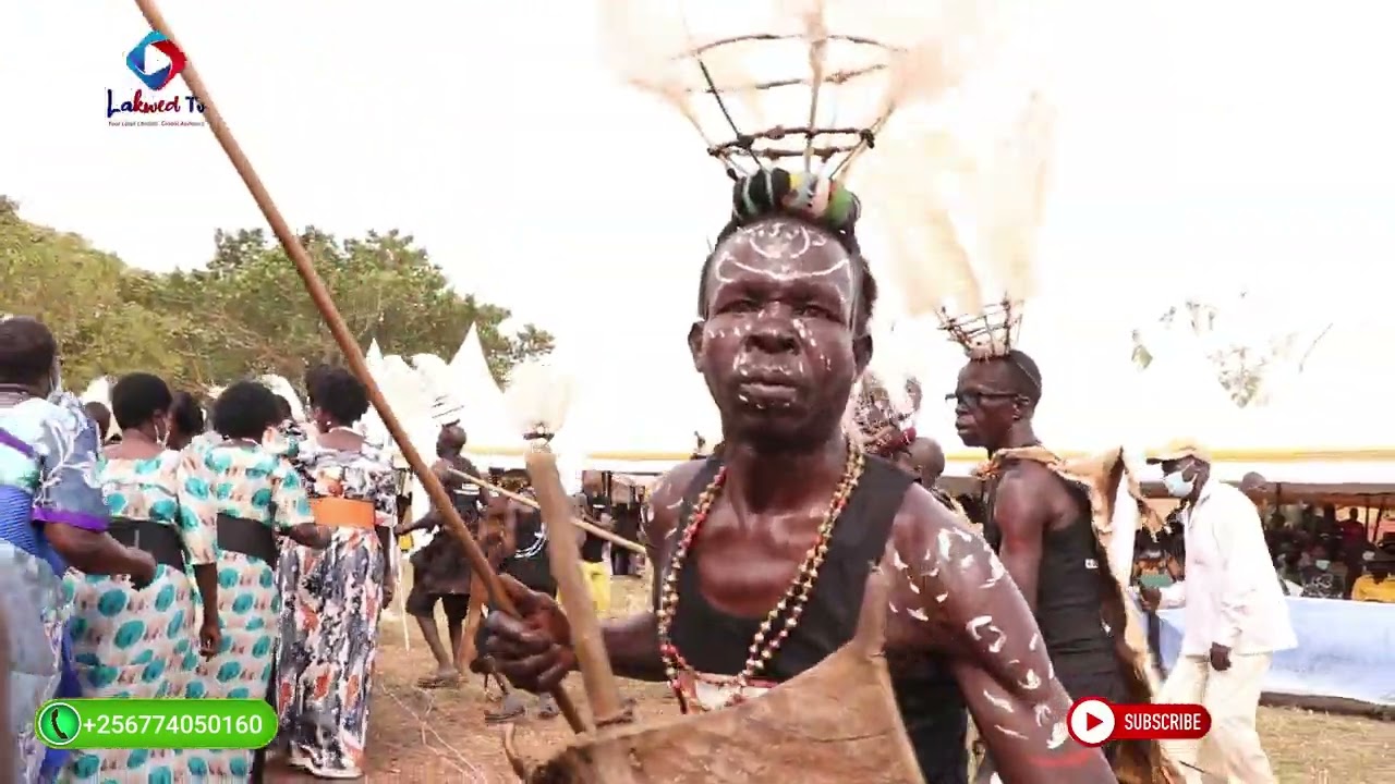 Hon Min Onek Hilary dances otole with Madiopei Lamwo